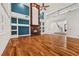 Bright living room with hardwood floors, a fireplace and staircase to the second floor at 358 Whispering Tree Ave, Las Vegas, NV 89183