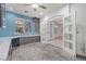 Office featuring built in cabinetry and counter tops, and views of the backyard pool at 358 Whispering Tree Ave, Las Vegas, NV 89183