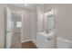Bathroom featuring modern vanity and walk-in shower at 416 Rossmoyne Ave, North Las Vegas, NV 89030