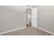 Bedroom featuring plush carpet, neutral paint, and modern baseboards at 416 Rossmoyne Ave, North Las Vegas, NV 89030