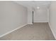 Bedroom featuring soft neutral carpet and a closet with sliding doors at 416 Rossmoyne Ave, North Las Vegas, NV 89030