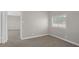Neutral bedroom features a window that provides natural light at 416 Rossmoyne Ave, North Las Vegas, NV 89030