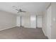 Large main bedroom features a modern ceiling fan and carpeted floor at 416 Rossmoyne Ave, North Las Vegas, NV 89030