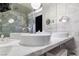 Sleek bathroom featuring double sinks, marble countertops, and modern fixtures for a spa-like experience at 4381 W Flamingo Rd # 2122, Las Vegas, NV 89103