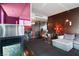 Stylish living room showcases a modern fireplace, sleek bar, and comfortable seating arrangement at 4381 W Flamingo Rd # 2122, Las Vegas, NV 89103