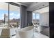 Bright bathroom features a soaking tub with city skyline views and modern decor at 4381 W Flamingo Rd # 2122, Las Vegas, NV 89103