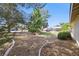 A partially landscaped backyard provides the perfect canvas for your outdoor dreams at 4409 W Red Coach Ave, North Las Vegas, NV 89031