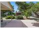 Large backyard, partially covered patio and mature trees, offering lots of outdoor space at 4409 W Red Coach Ave, North Las Vegas, NV 89031