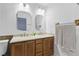 Bathroom boasts double sinks with modern fixtures and ample counter space at 4409 W Red Coach Ave, North Las Vegas, NV 89031