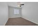Bedroom featuring a ceiling fan, blinds, and carpet flooring at 4619 Reliant St, North Las Vegas, NV 89031