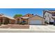 Charming single-story home with a well-maintained front yard and a two-car garage at 4619 Reliant St, North Las Vegas, NV 89031