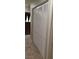 Hallway featuring tile flooring and access to rooms with closet at 4619 Reliant St, North Las Vegas, NV 89031