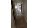 Hallway featuring tile flooring and access to various rooms at 4619 Reliant St, North Las Vegas, NV 89031