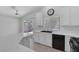 Contemporary kitchen with white cabinetry, quartz counters and stainless steel appliances at 4619 Reliant St, North Las Vegas, NV 89031