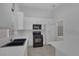 Well-equipped kitchen with modern appliances, ample counter space, and a convenient pantry at 4619 Reliant St, North Las Vegas, NV 89031