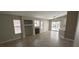 Neutral toned living room with fireplace and sliding door to the outside at 4619 Reliant St, North Las Vegas, NV 89031