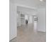 Open-concept living space with tiled floors and an adjoining fireplace at 4619 Reliant St, North Las Vegas, NV 89031