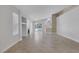 Spacious living room featuring tile floors, fireplace, and sliding glass doors to the backyard at 4619 Reliant St, North Las Vegas, NV 89031