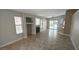 Bright living area featuring neutral walls, a fireplace, and sliding door access to the backyard at 4619 Reliant St, North Las Vegas, NV 89031