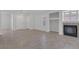 Inviting living room with a cozy fireplace, ample space, and neutral decor at 4619 Reliant St, North Las Vegas, NV 89031