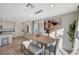 Dining area near the kitchen offers modern pendant lighting and neutral decor at 4977 Birchland Manor Ave, Las Vegas, NV 89139