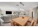 Living room and dining area offer an open floor plan and natural light at 4977 Birchland Manor Ave, Las Vegas, NV 89139