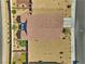 Directly above, a home with a red-tiled roof, desert landscaping and private backyard patio area is shown at 5460 Chippewa, Pahrump, NV 89061