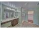 Bathroom featuring a vanity, a shower-tub combination, and tile flooring at 5460 Chippewa, Pahrump, NV 89061
