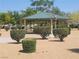 Community park features a shaded gazebo and lush landscaping creating a serene and inviting outdoor space at 5460 Chippewa, Pahrump, NV 89061