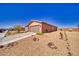 Well-maintained single-story home with desert landscaping and an attached two-car garage at 5460 Chippewa, Pahrump, NV 89061