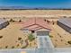 Charming single-story home features a desert landscaped yard, a two-car garage, and a durable-tile roof at 5460 Chippewa, Pahrump, NV 89061