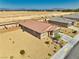 Comfortable single-story home with a desert landscaped yard, a two-car garage, and a sturdy-tile roof at 5460 Chippewa, Pahrump, NV 89061