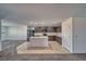 Open kitchen boasts stainless steel appliances, island, and plenty of cabinets and countertop space perfect for cooking and entertaining at 5460 Chippewa, Pahrump, NV 89061