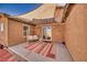 Relaxing covered patio with a swing, perfect for outdoor lounging and enjoying the fresh air at 5460 Chippewa, Pahrump, NV 89061