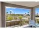 Balcony view showing city landscape and mountains, with patio furniture for relaxing and enjoying the outdoors at 55 Strada Fontana, Henderson, NV 89011