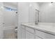 Modern bathroom featuring a white vanity, sleek mirror, and a shower/tub combination at 55 Strada Fontana, Henderson, NV 89011