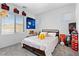 Fun bedroom features a queen bed with a playful decorative theme at 55 Strada Fontana, Henderson, NV 89011