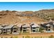 Aerial view of a home with a pool and desert landscaping in a beautiful community at 55 Strada Fontana, Henderson, NV 89011