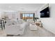 Bright and airy living room featuring stylish furnishings and an open floor plan at 55 Strada Fontana, Henderson, NV 89011
