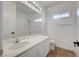 Bathroom featuring a sink vanity, a shower, and a toilet at 5622 Sage Pines Dr, Las Vegas, NV 89118