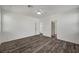 Spacious bedroom boasting hardwood floors, a ceiling fan, and plenty of natural light at 5622 Sage Pines Dr, Las Vegas, NV 89118