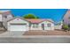 Charming single-story home with a well-maintained exterior and desert landscaping at 5622 Sage Pines Dr, Las Vegas, NV 89118