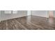 Spacious living area with contemporary flooring and ample natural light at 5622 Sage Pines Dr, Las Vegas, NV 89118