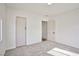 Bedroom featuring new carpet, paint, and closet at 603 W Adams Ave, Las Vegas, NV 89106