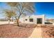 Charming single story home featuring a unique architectural style and desert landscaping at 603 W Adams Ave, Las Vegas, NV 89106