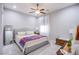 Cozy bedroom features soft lighting, neutral tones, and plush carpeting at 6060 N Conquistador St, Las Vegas, NV 89149