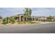 Attractive single-story home with a three-car garage, xeriscaping, and combination driveway at 6060 N Conquistador St, Las Vegas, NV 89149