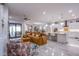 Open concept living space featuring an eat-in kitchen, and a living room area at 6060 N Conquistador St, Las Vegas, NV 89149
