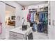 Well-lit closet with custom shelving and ample space for storage and organization at 6060 N Conquistador St, Las Vegas, NV 89149