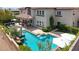 Backyard featuring a beautiful pool, outdoor lounge area, and mature landscaping for privacy and relaxation at 628 Chervil Valley Dr, Las Vegas, NV 89138